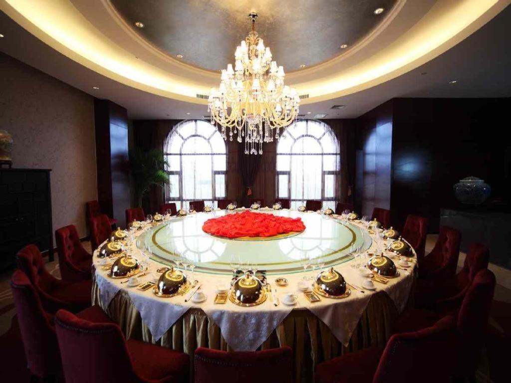 Haiyang Shenglong Jianguo Hotel Fengcheng  Exterior photo