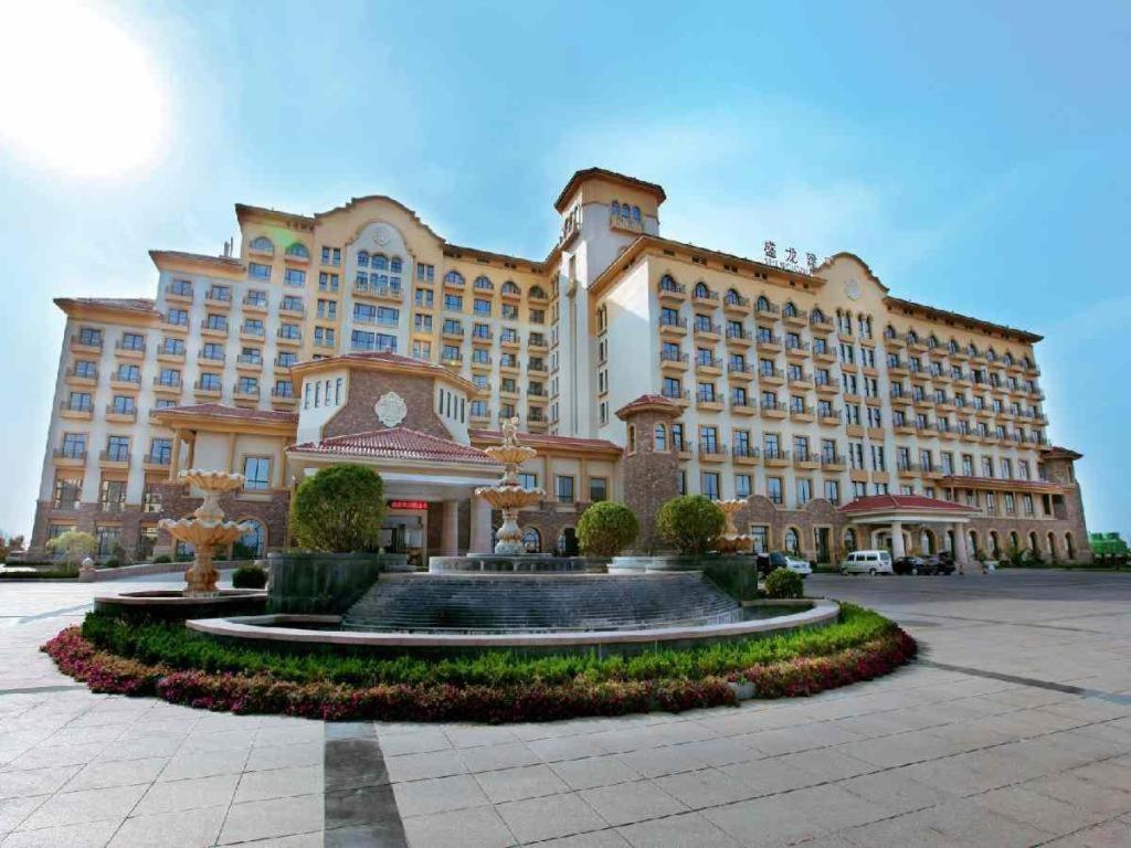 Haiyang Shenglong Jianguo Hotel Fengcheng  Exterior photo