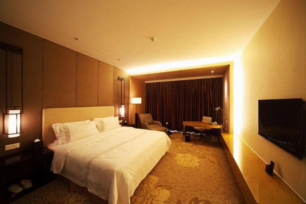 Haiyang Shenglong Jianguo Hotel Fengcheng  Exterior photo
