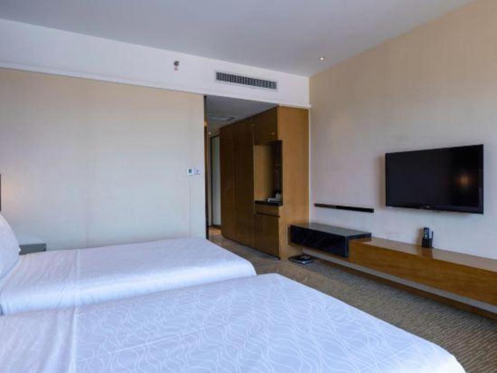 Haiyang Shenglong Jianguo Hotel Fengcheng  Exterior photo