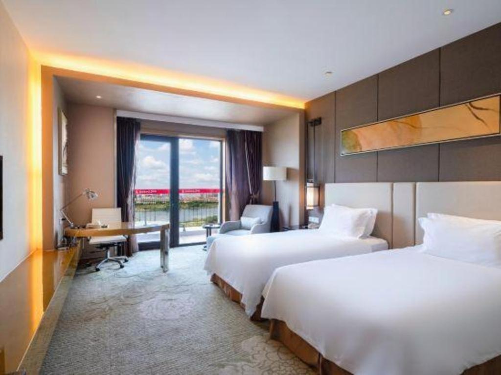 Haiyang Shenglong Jianguo Hotel Fengcheng  Exterior photo