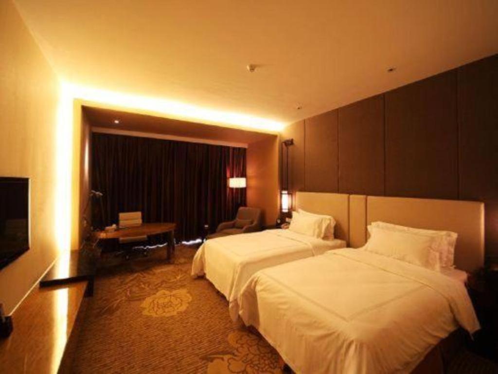 Haiyang Shenglong Jianguo Hotel Fengcheng  Exterior photo