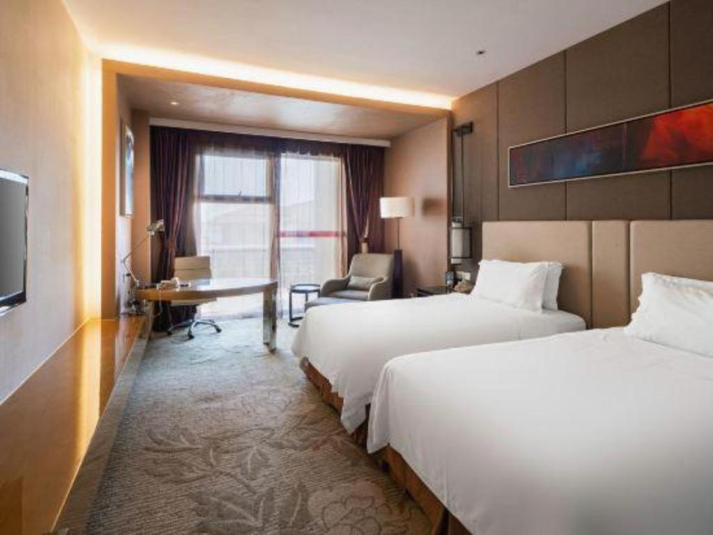 Haiyang Shenglong Jianguo Hotel Fengcheng  Exterior photo