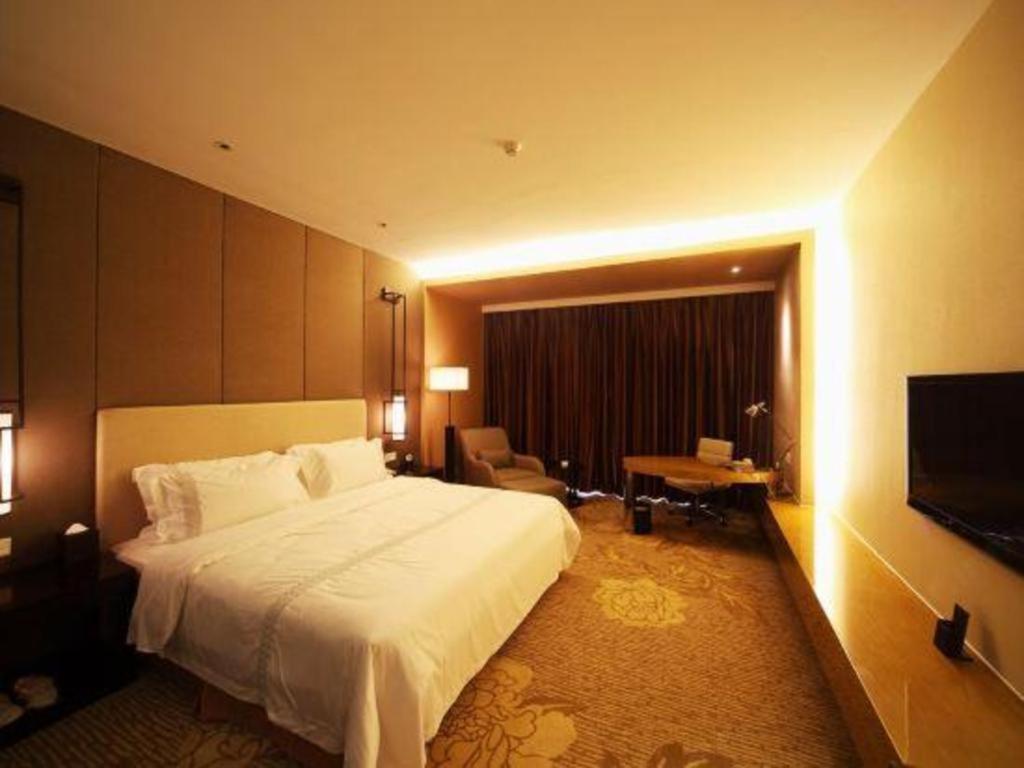 Haiyang Shenglong Jianguo Hotel Fengcheng  Exterior photo