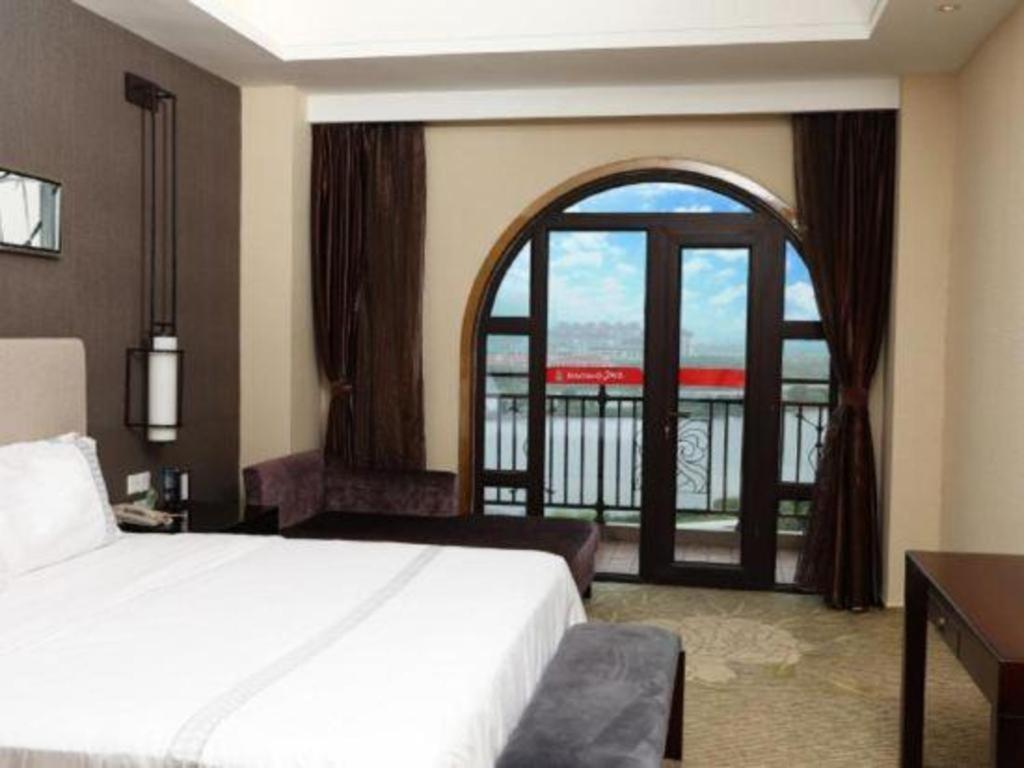 Haiyang Shenglong Jianguo Hotel Fengcheng  Exterior photo